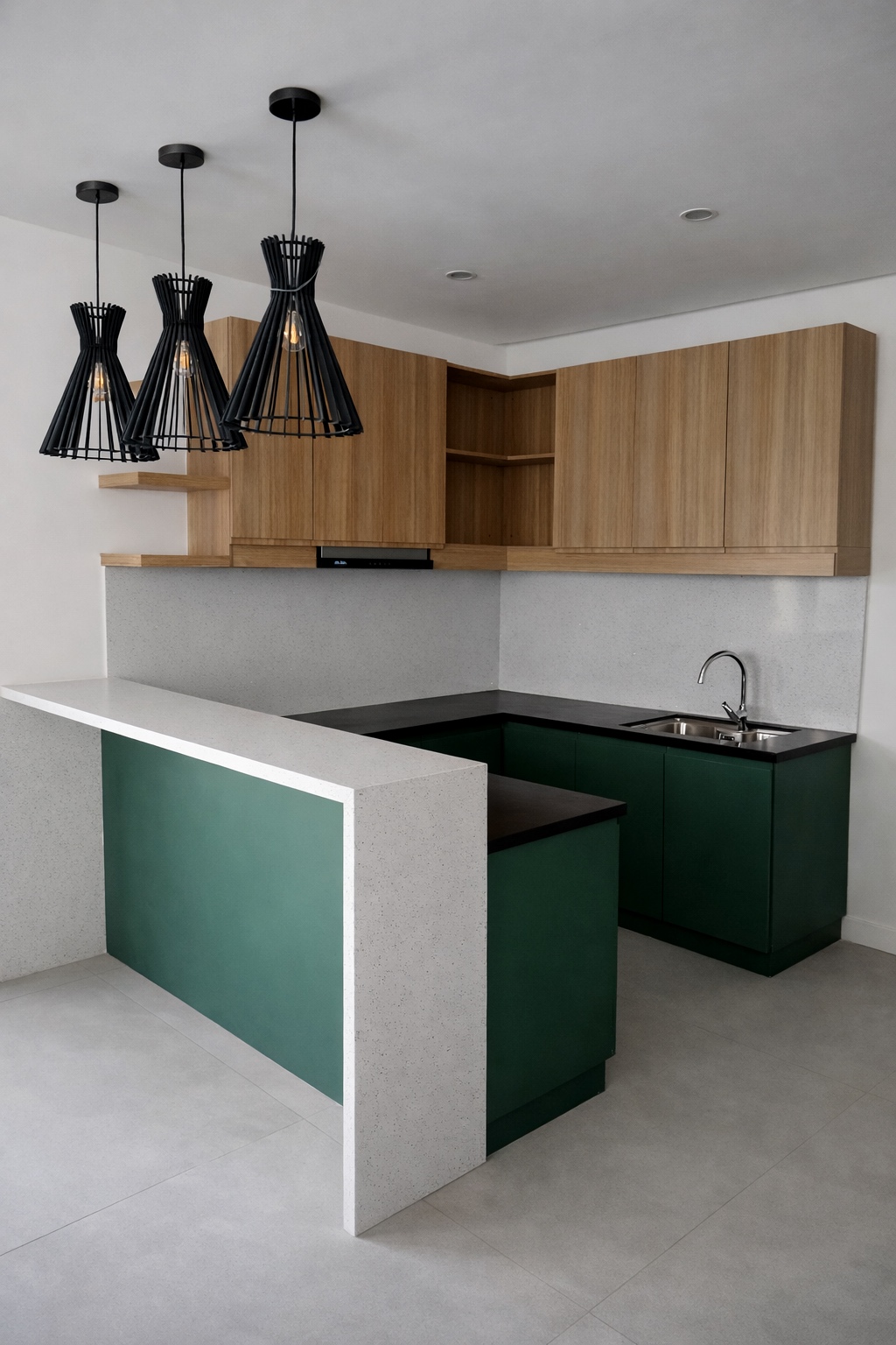 Modern green and wood kitchen with terrazzo island and pendant lights