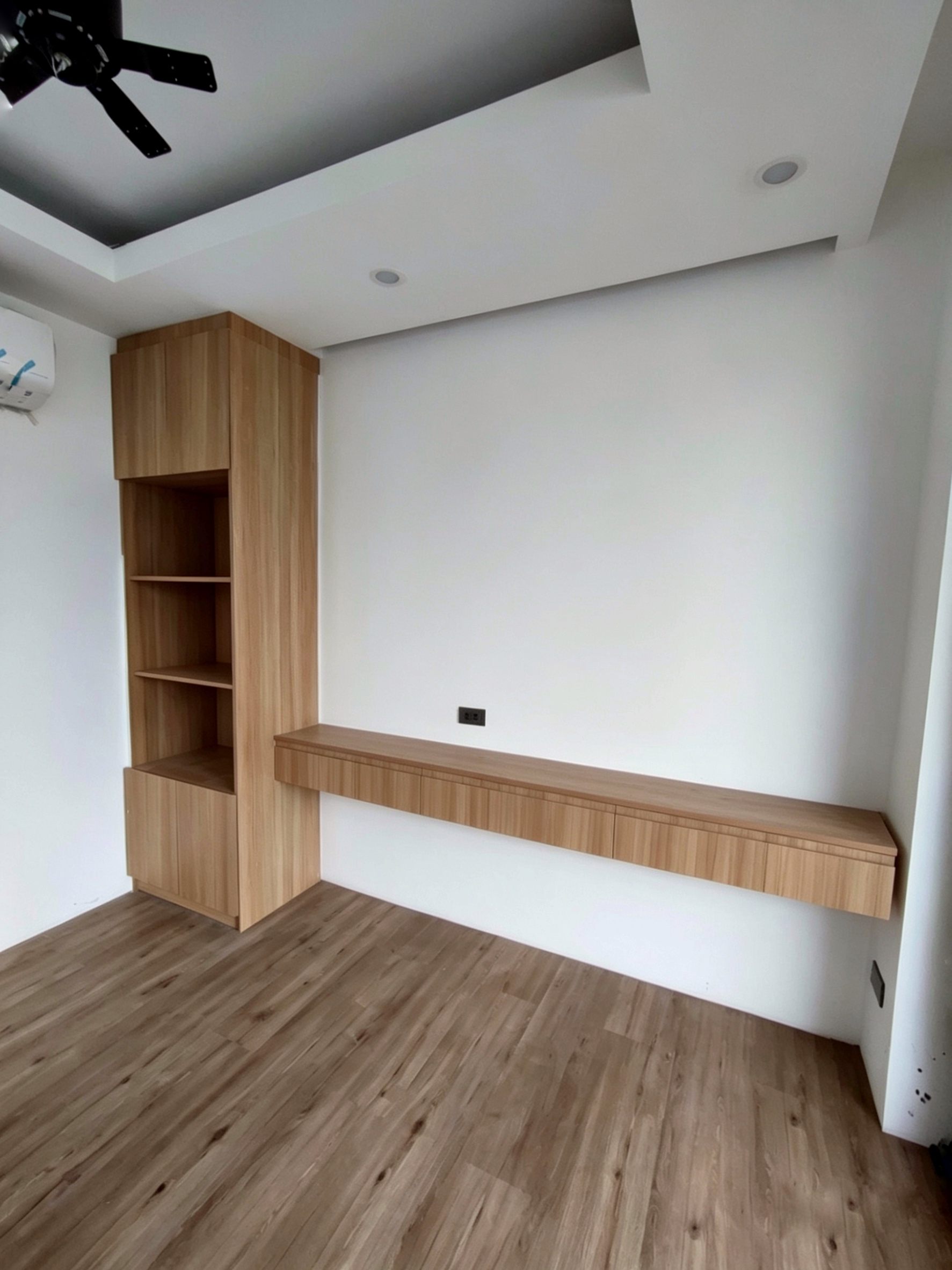 Wood TV unit with open bookshelf and floating console